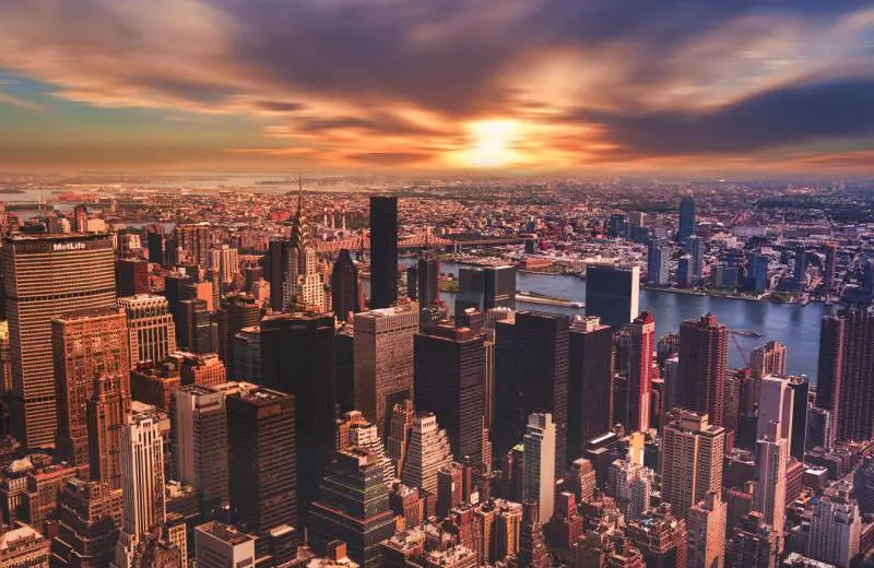 A view of the city skyline at sunset.